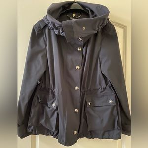 Burberry wind jacket.Dark blue, almost black. Drawstring in waist and bottom